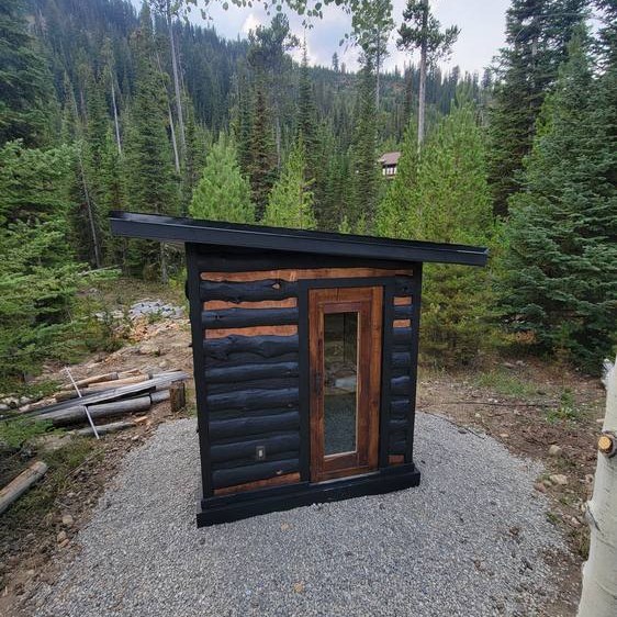 Black Root exterior sauna build in the Montana woods
