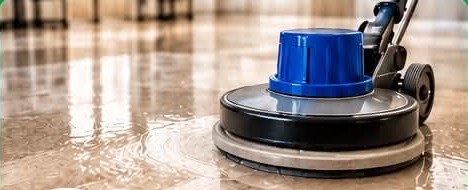 Floor machine polishing a tile floor